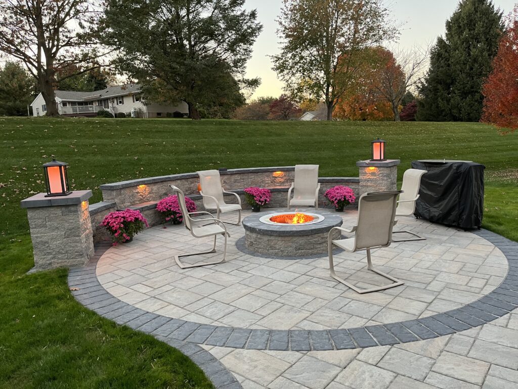 Paver patio with fire pit and chairs in Boyertown