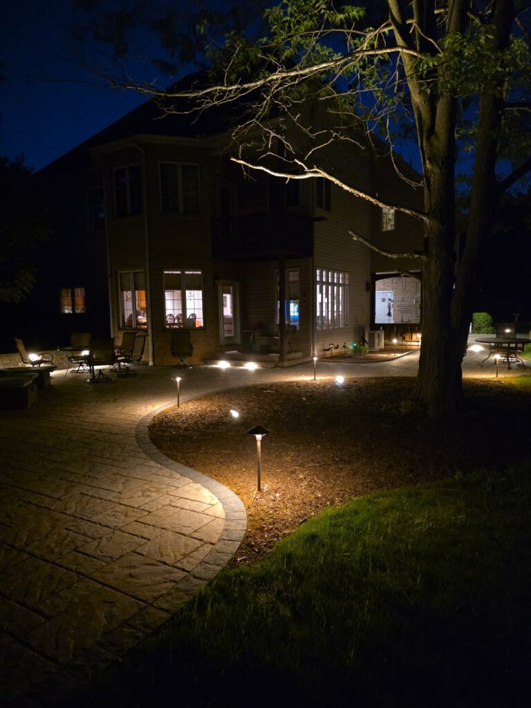 Paver patio with outdoor lighting