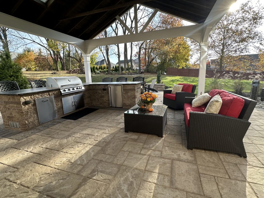 An outdoor kitchen and patio